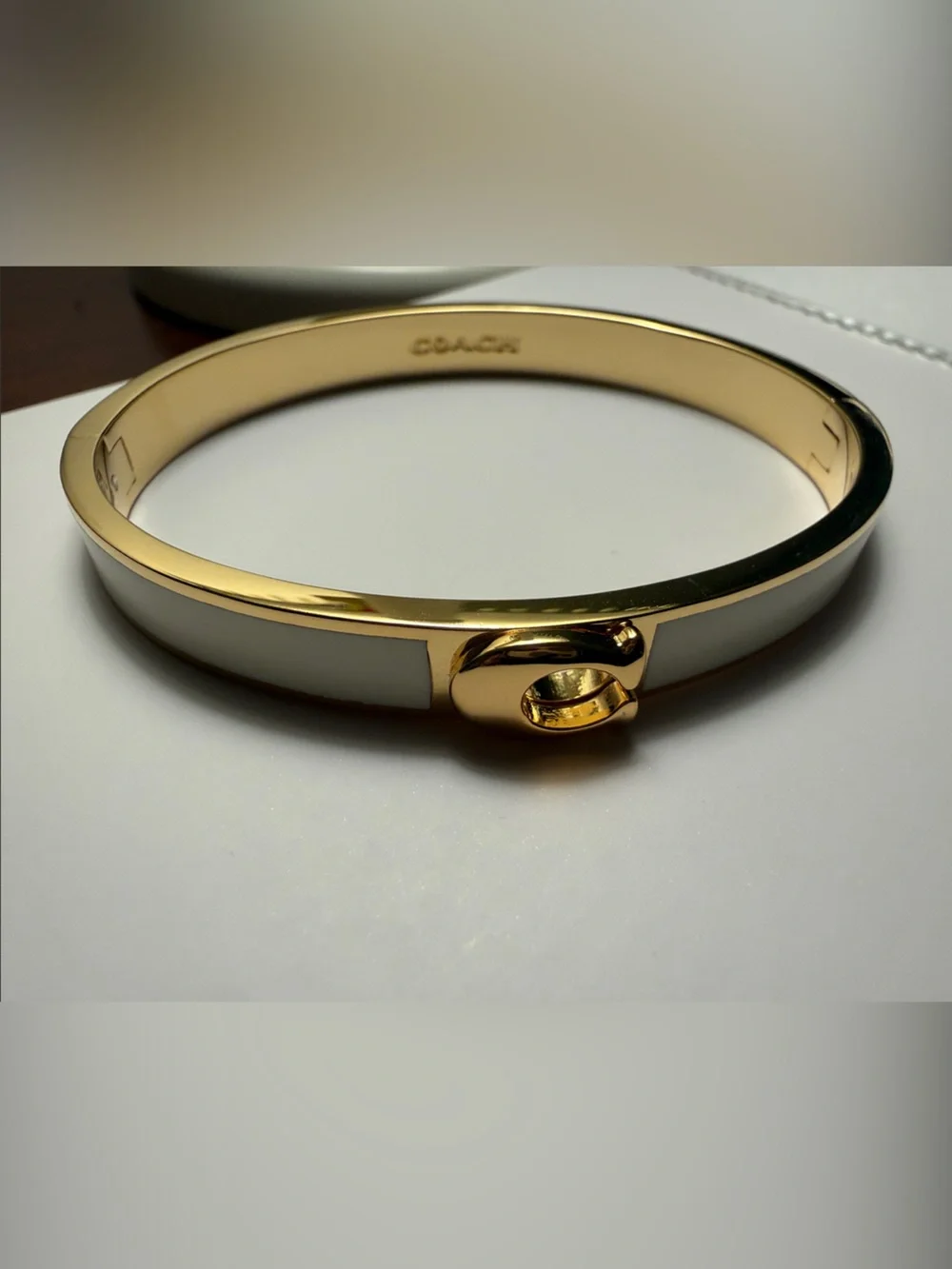 COACH Gold-Tone and Cream Enamel Hinged Bangle Bracelet